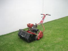 [photo: lawnmower]